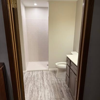 Finished bathroom remodel with new vanity and flooring